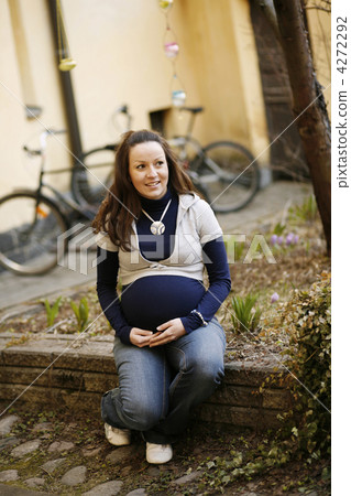 Happy young pregnant woman outdoors. 4272292