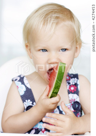 Cute little girl eating a watermelon. 4274453