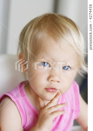 Portrait of a thoughtful looking toddler. 4274456