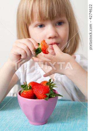 LIttle girl eating strawberries LIttle girl eating strawberries 4274622