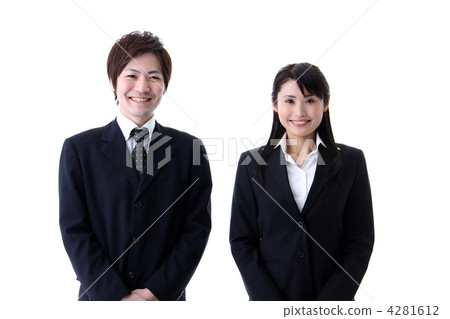 站立在衣服的商人和女商人 站立在衣服的商人和女商人 4281612