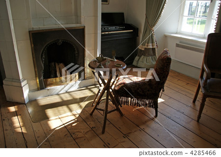 At a fireplace At a fireplace 4285466