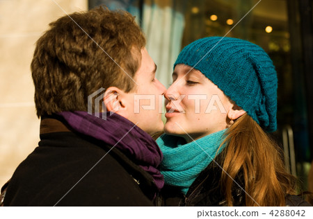 Romantic couple in love kissing outdoors Romantic couple in love kissing outdoors 4288042