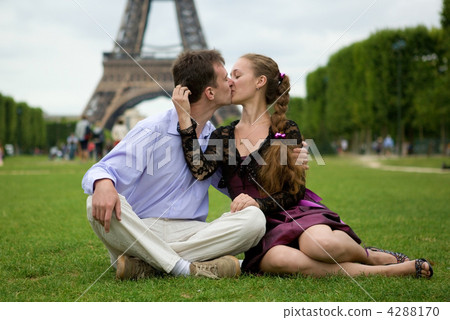 Romantic couple in Paris kissing near the Eiffel Tower Romantic couple in Paris kissing near the Eiffel Tower 4288170