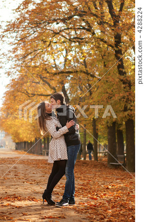 Young beautiful couple in the Luxembourg garden at fall. Paris, 4288224