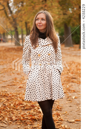 Beautiful young woman at fall Beautiful young woman at fall 4288229