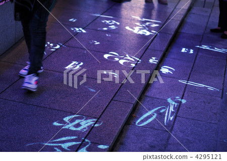 Numbers dancing on the ground at night Numbers dancing on the ground at night 4295121