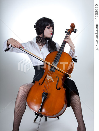 Romantic girl playing cello 4308620