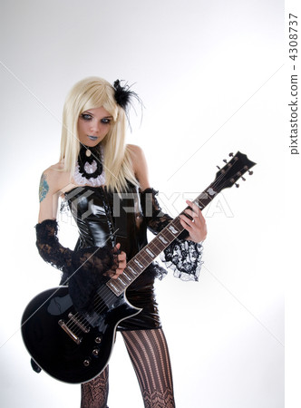 Sexy gothic girl with guitar 4308737