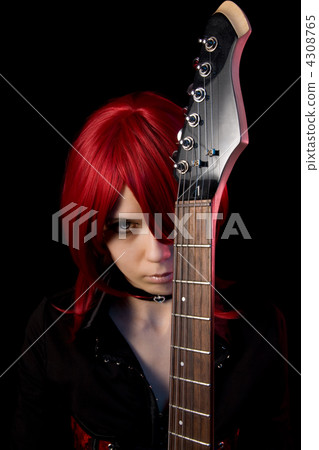 Redhead gothic girl with guitar 4308765