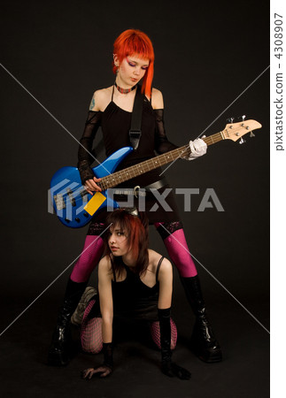 Two attractive girls with guitar 4308907