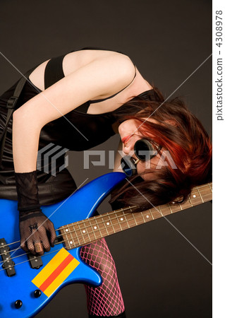 Musician with bass guitar Musician with bass guitar 4308978