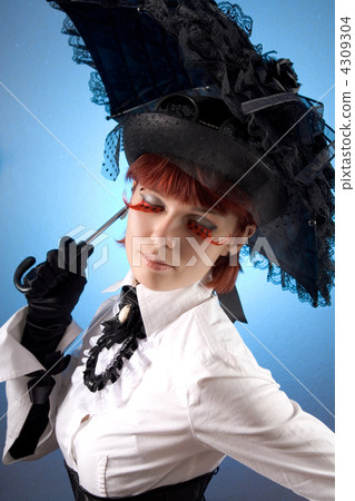 Beautiful girl in Victorian style clothes with umbrella 4309304