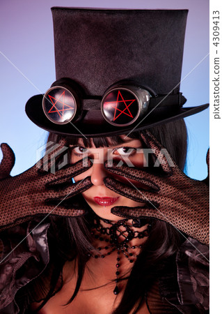 Portrait of gothic girl wearing tophat Portrait of gothic girl wearing tophat 4309413