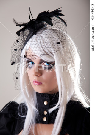 Gothic girl with creative make-up 4309420