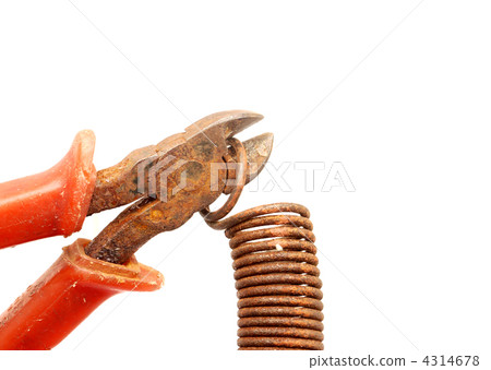 Nippers and a spring on a white background Nippers and a spring on a white background 4314678