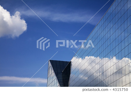 Modern building and blue sky reflection 4315750