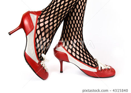 Female legs in red shoes 4315840
