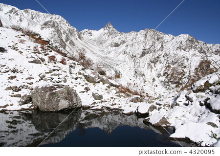 tengu pond, mount yari, snow mountain 4320095