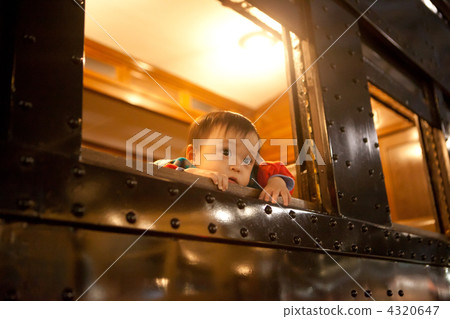 Baby staring outside the window 4320647