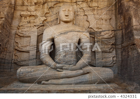 Ancient sitting Buddha image 4324331