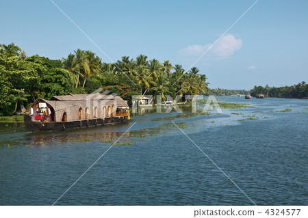 Houseboat on Kerala backwaters, India Houseboat on Kerala backwaters, India 4324577