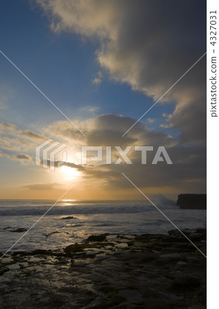 Rocky ocean coast at sunset Rocky ocean coast at sunset 4327031