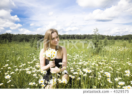 Young Woman Relaxing Outdoors 4329575