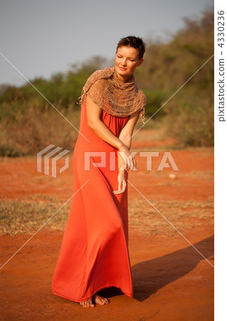 Beautiful girl dressed  terracotta dress 4330236
