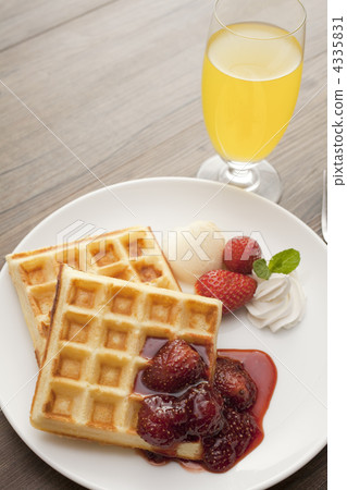 Waffle and orange juice 4335831
