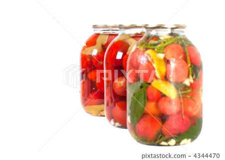red tomatoes in a glass jar 4344470
