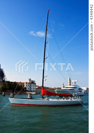 Sailing yacht in peripheral passage waters. Venice 4349442