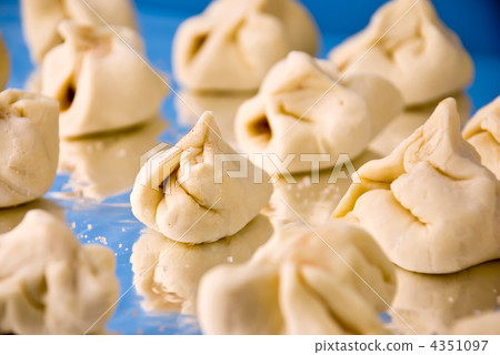 Raw homemade cinnamon cookies at tray ready for baking. Shallow 4351097