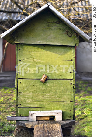 Bee-garden. Old wooden beehive at farm 4351654