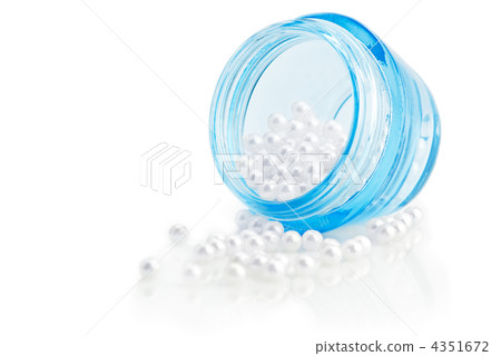 Cosmetic cream container with natural pearls isolated on white b Cosmetic cream container with natural pearls isolated on white b 4351672