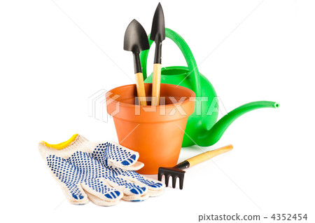 Garden tools. Terracotta frower pot, watering can and garden too Garden tools. Terracotta frower pot, watering can and garden too 4352454