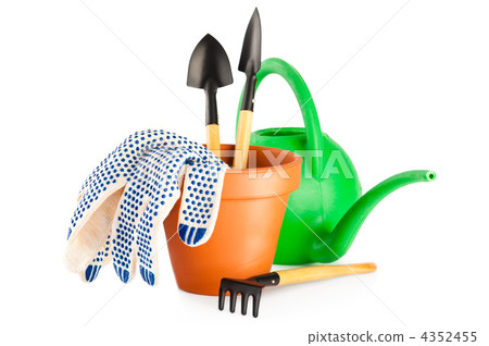 Garden tools. Terracotta frower pot with gloves, watering can an 4352455