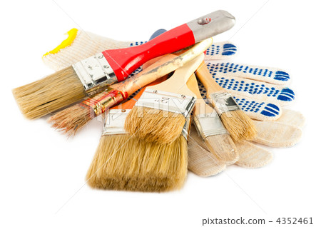 Painter working tools. Paintbrushes and gloves. Shallow dept of Painter working tools. Paintbrushes and gloves. Shallow dept of 4352461
