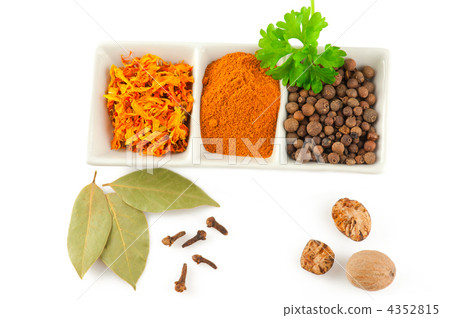 Spices. Mix of different herbs: pepper balls, saffron, chili, la 4352815