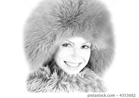 Closeup portrait of young girl in furry hat. High key, black and 4353082