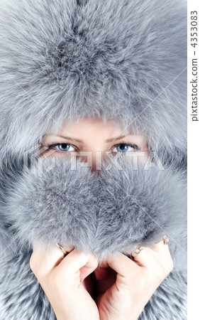 Closeup portrait of young girl in furry hat 4353083