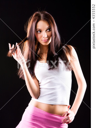 Young slim woman in pink skirt Young slim woman in pink skirt 4355552