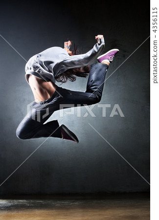 Young woman dancer jumping Young woman dancer jumping 4356115