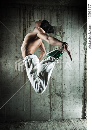 Young man dancer jumping 4356577