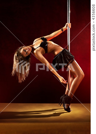Young sexy pole dance woman Young sexy pole dance woman 4356608