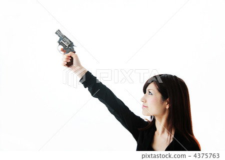 A woman with a handgun 4375763