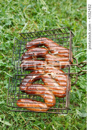 Hot sausages on barbecue 4382482