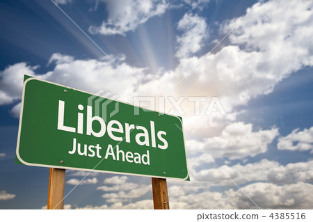 Liberals Green Road Sign and Clouds 4385516