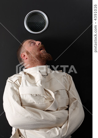 Paranoid man in a straitjacket Paranoid man in a straitjacket 4391016