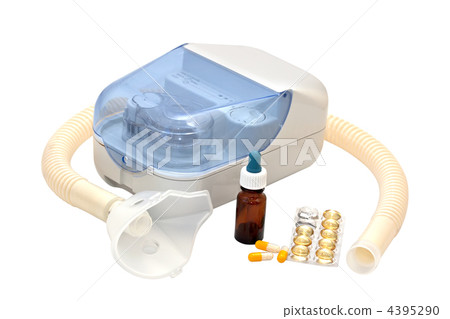 Ultrasonic nebulizer and medicines on a white background Ultrasonic nebulizer and medicines on a white background 4395290